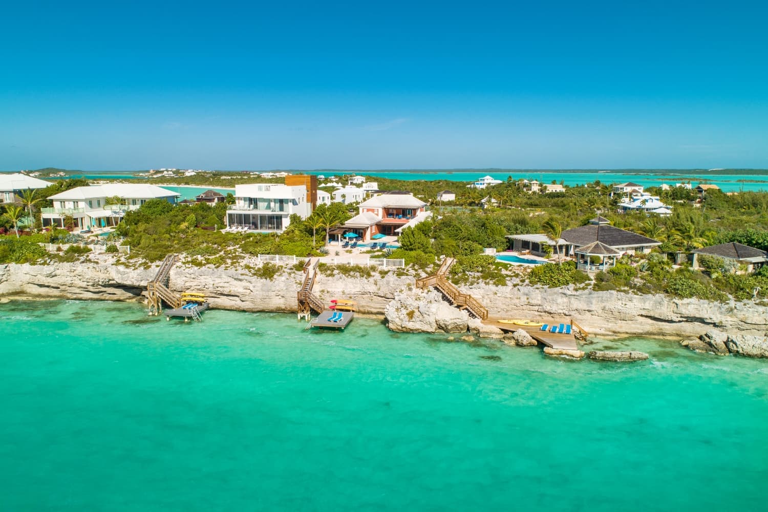 Aerial showing dock, house and pool area