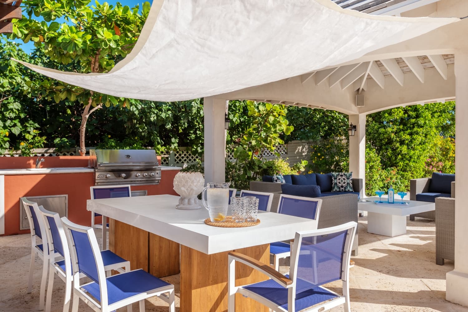 Outdoor kitchen and dining at the cabana